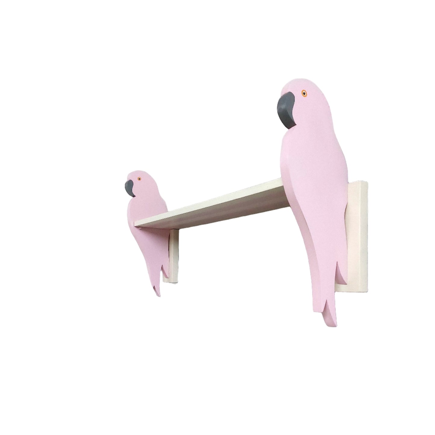 Two pink parrot-shaped brackets on a white shelf against a white wall.