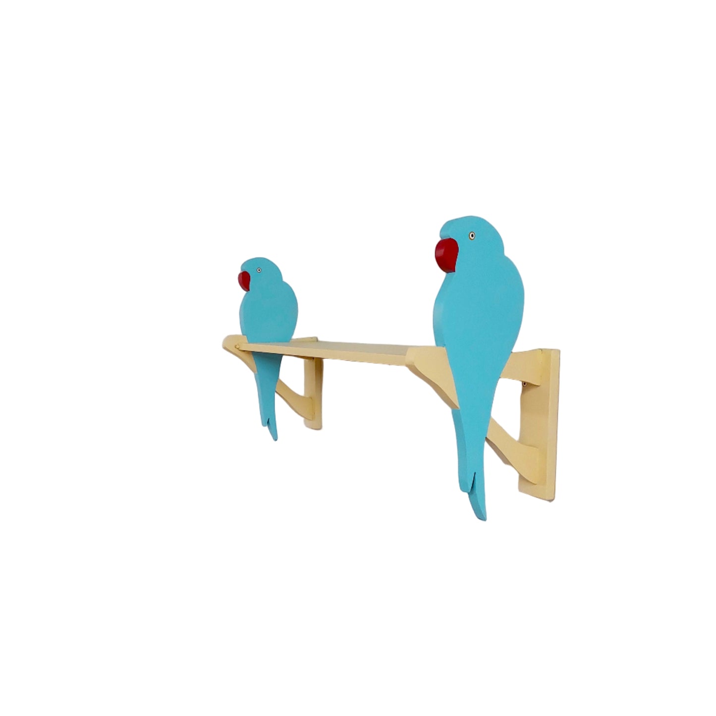 Two blue parrot-shaped decorations on a wooden shelf against a white wall.