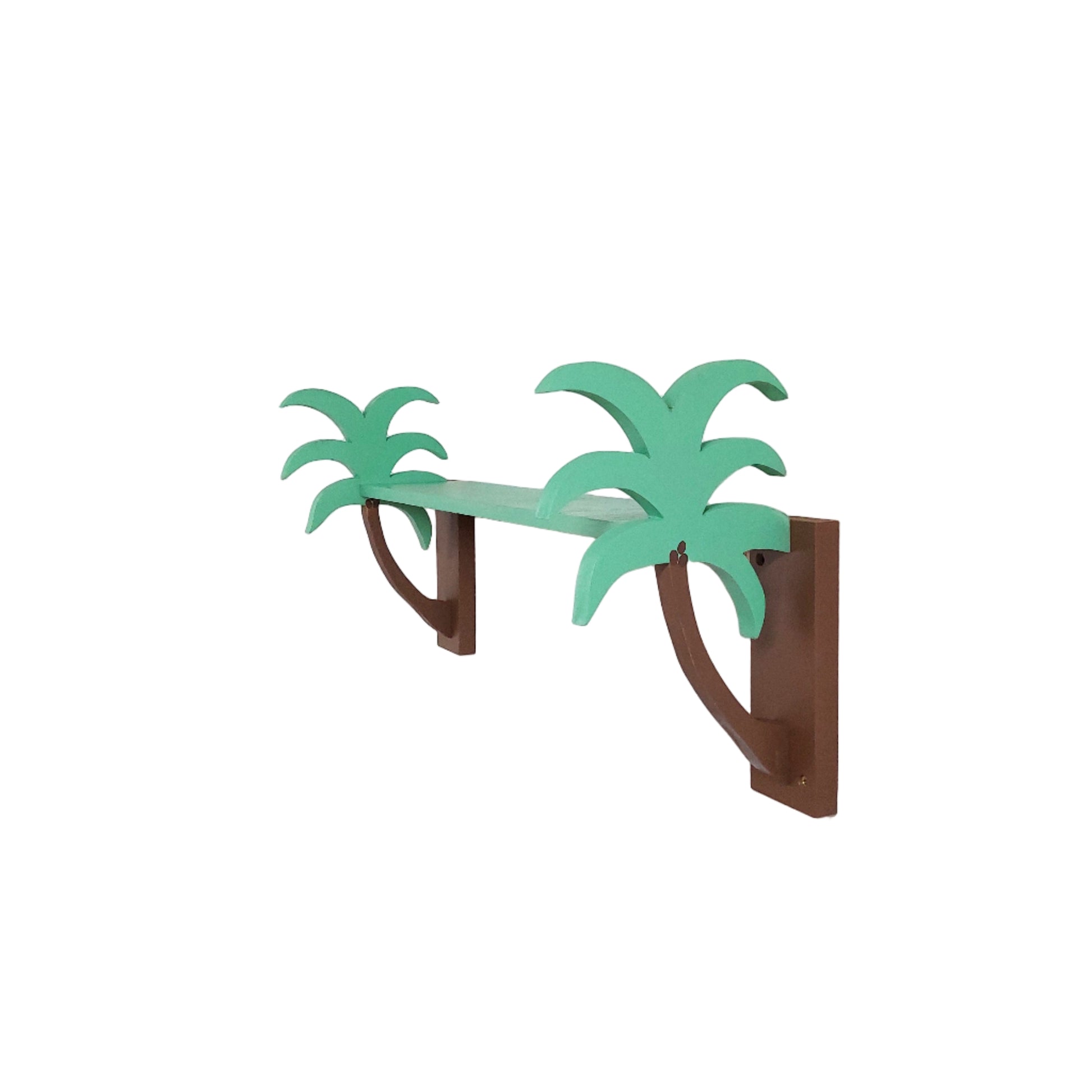 Wall-mounted shelf with green palm tree design on a white wall