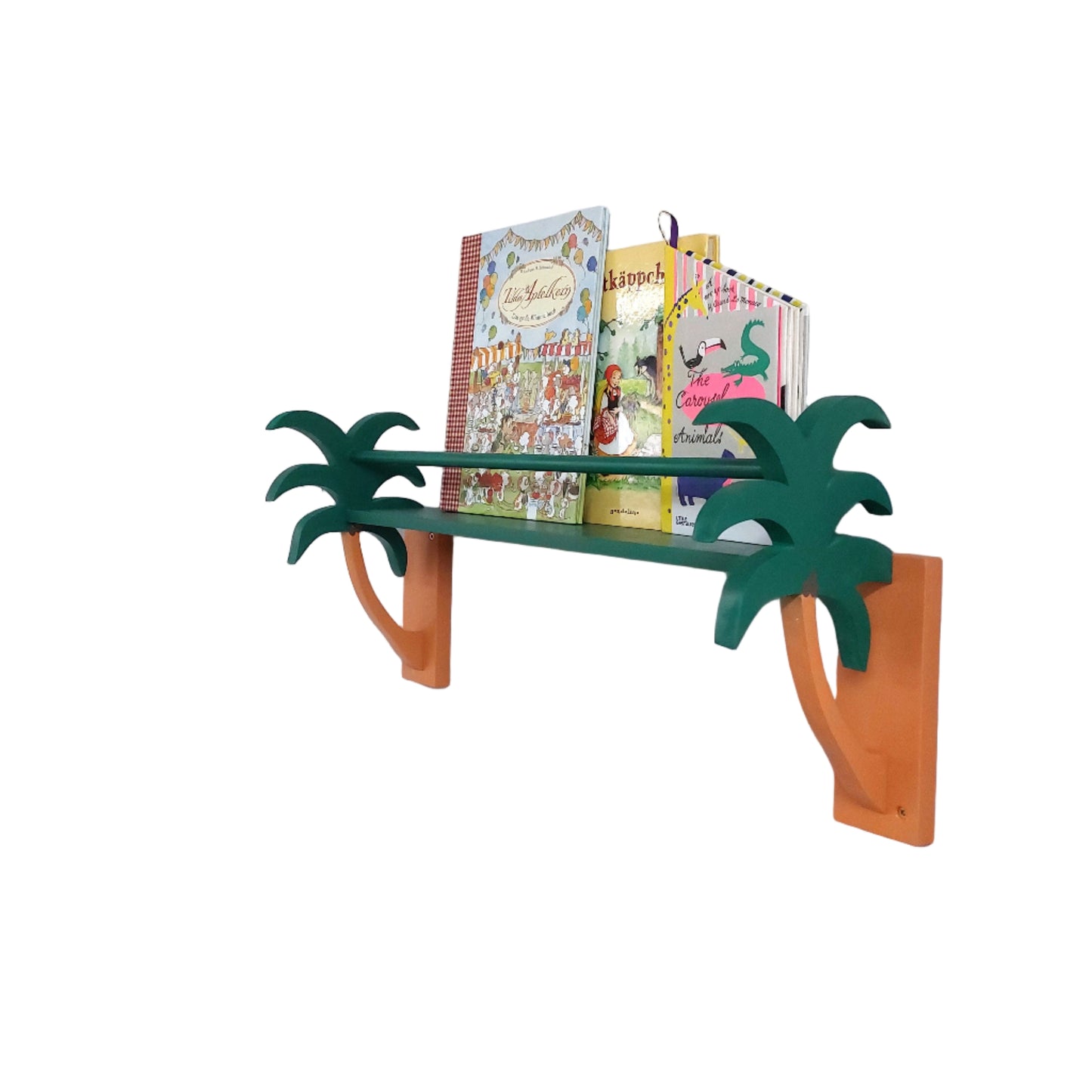 Children's bookshelf with palm tree design against a white wall