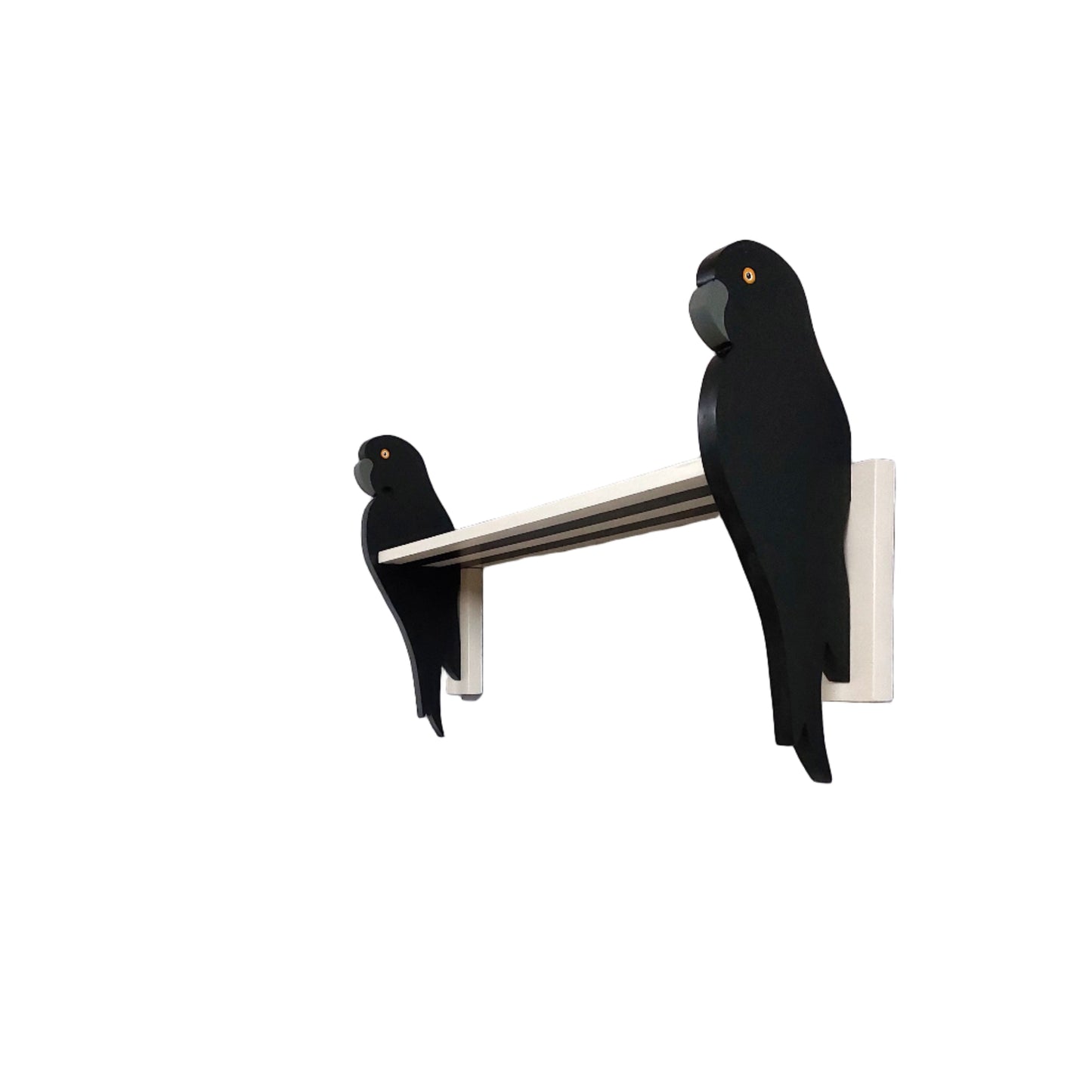 Two black parrot-shaped shelf brackets on a white background