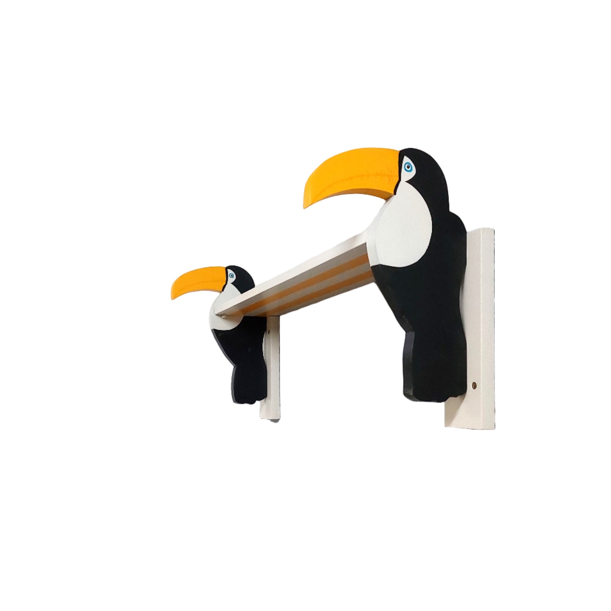 Toucan-shaped shelf brackets on a white wall